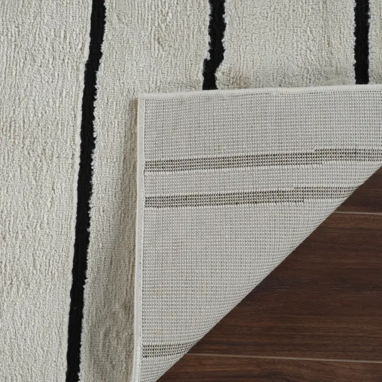 4' X 6' Cream and Black Abstract Distressed Area Rug