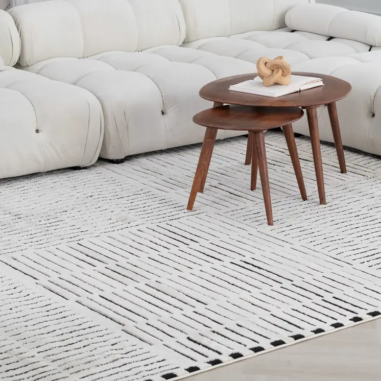 8' X 11' Cream and Black Abstract Distressed Area Rug