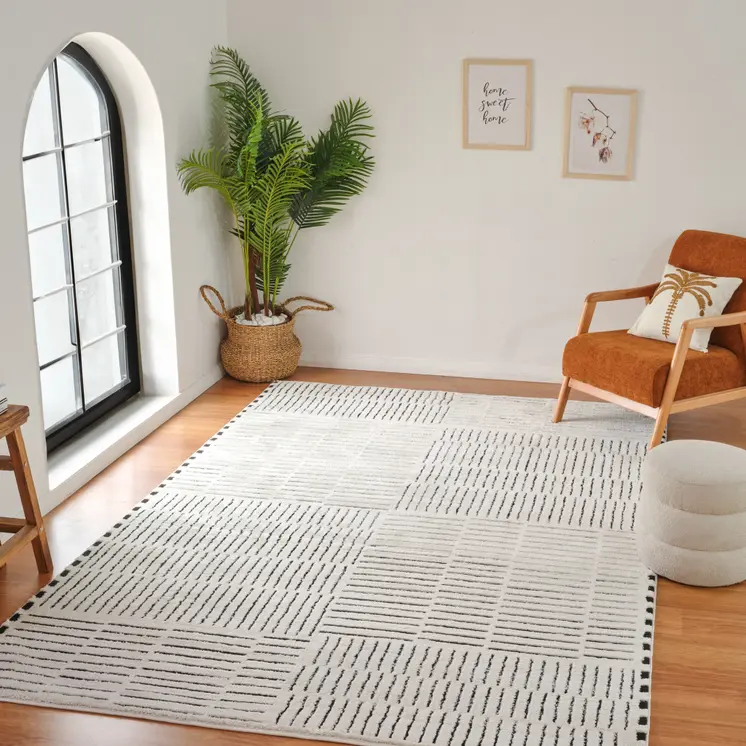 8' X 11' Cream and Black Abstract Distressed Area Rug
