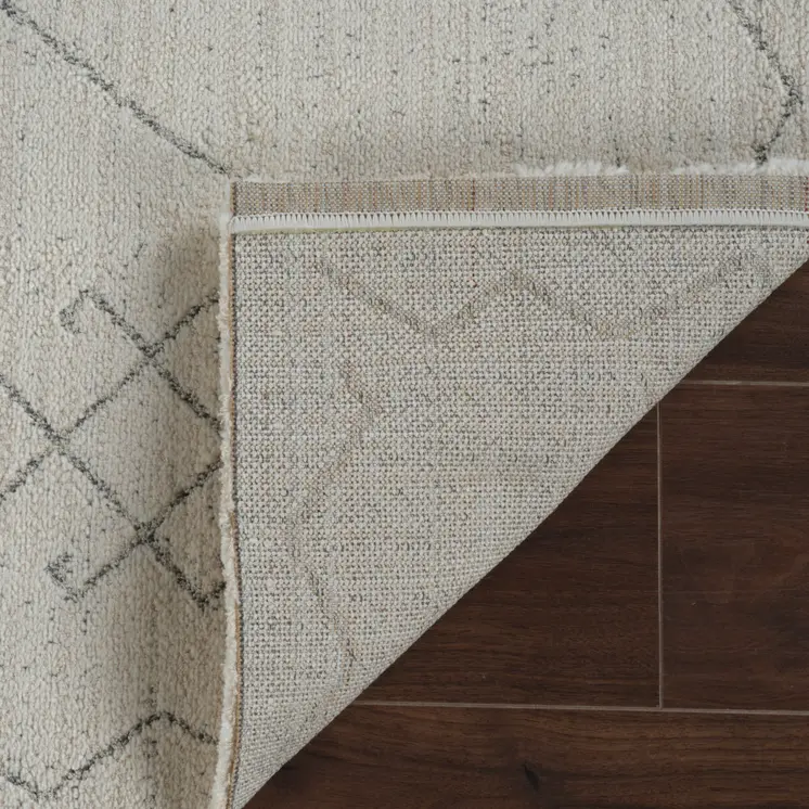 7' X 10' Cream and Beige Abstract Non Skid Area Rug
