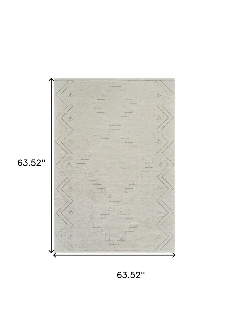 5' X 8' Cream and Beige Abstract Distressed Area Rug