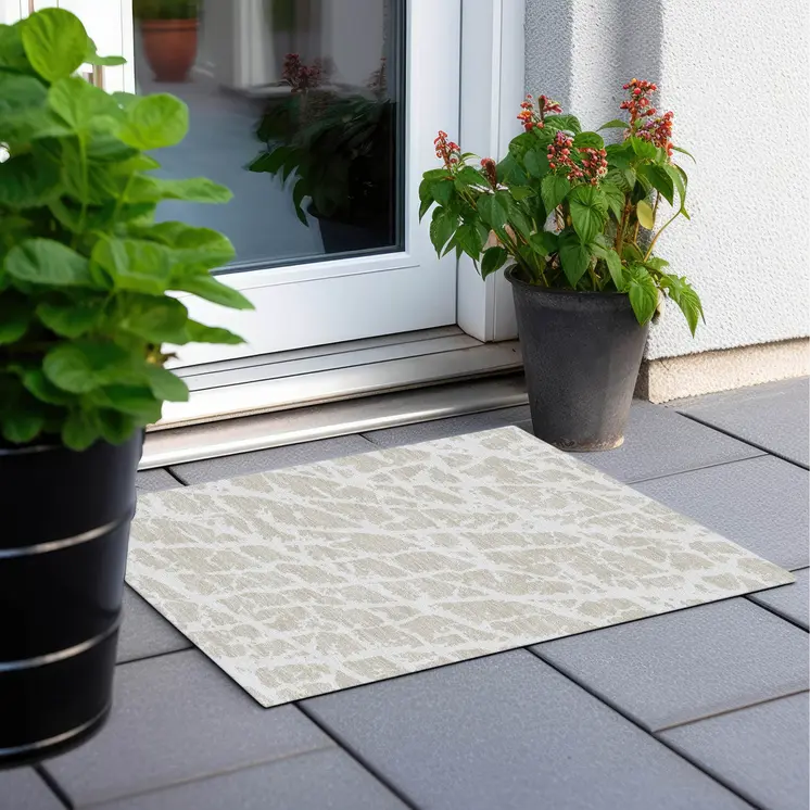 2' X 3' Beige and Ivory Abstract Washable Non Skid Indoor Outdoor Area Rug
