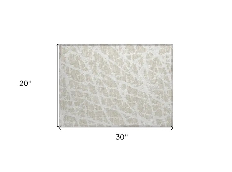2' X 3' Beige and Ivory Abstract Washable Non Skid Indoor Outdoor Area Rug