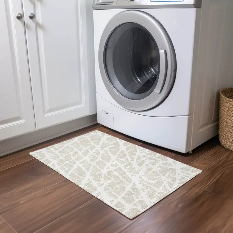 2' X 3' Beige and Ivory Abstract Washable Non Skid Indoor Outdoor Area Rug