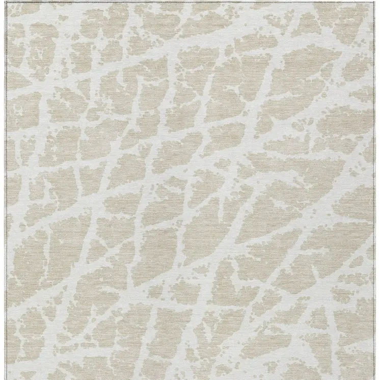 3' X 5' Beige and Ivory Abstract Washable Non Skid Indoor Outdoor Area Rug