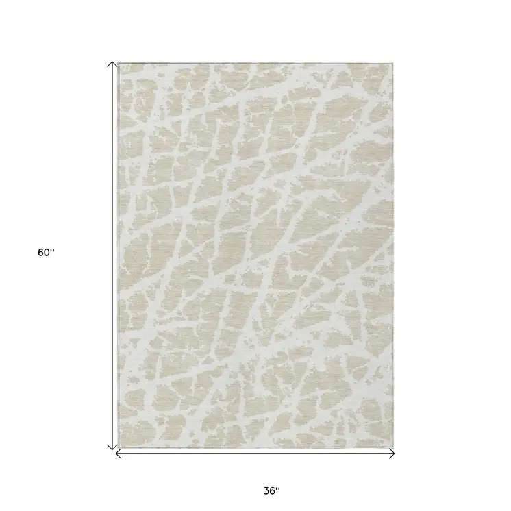 3' X 5' Beige and Ivory Abstract Washable Non Skid Indoor Outdoor Area Rug