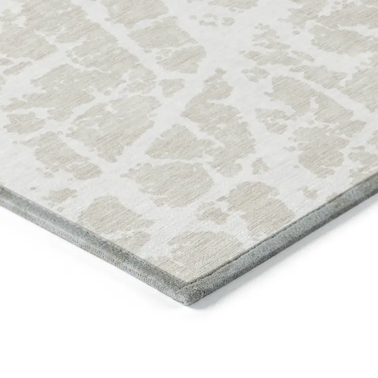 9' X 12' Beige and Ivory Abstract Washable Non Skid Indoor Outdoor Area Rug