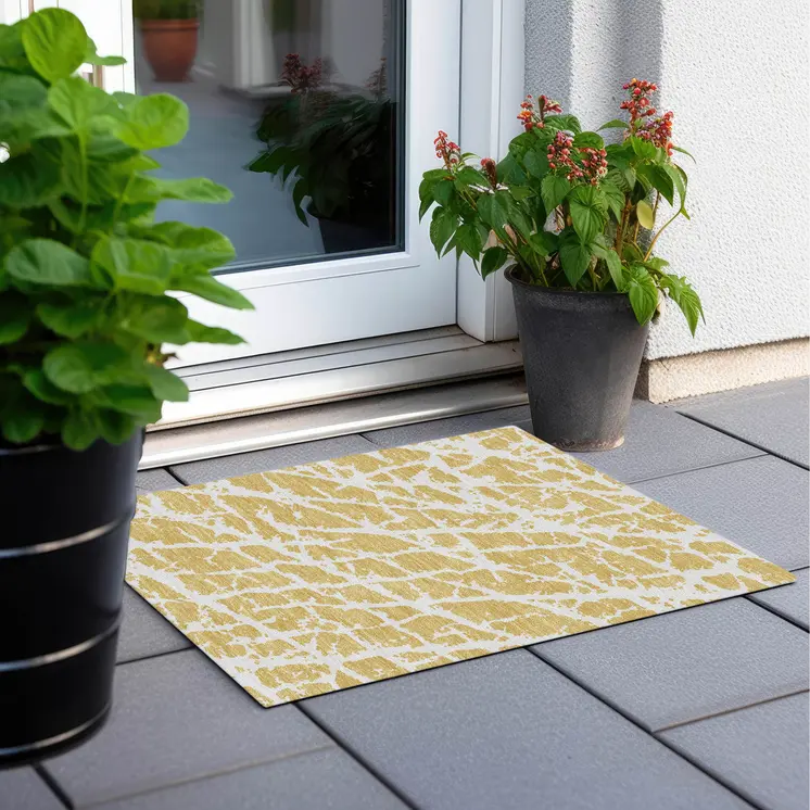 2' X 3' Gold and White Abstract Washable Non Skid Indoor Outdoor Area Rug