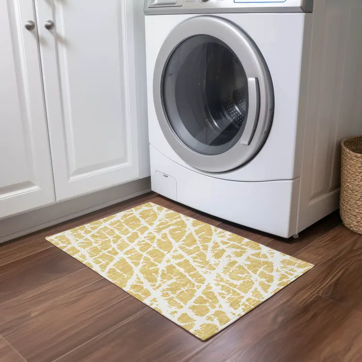 2' X 3' Gold and White Abstract Washable Non Skid Indoor Outdoor Area Rug