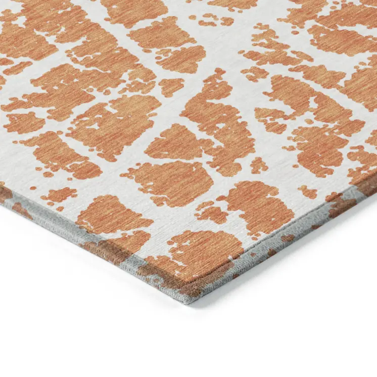 9' X 12' Orange and White Abstract Washable Non Skid Indoor Outdoor Area Rug