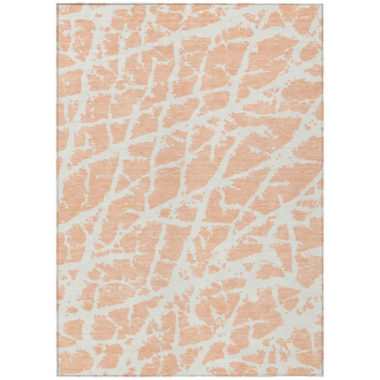 5' X 8' Peach and Ivory Abstract Washable Non Skid Indoor Outdoor Area Rug