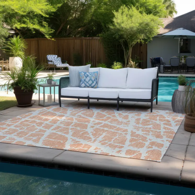 8' X 10' Peach and Ivory Abstract Washable Non Skid Indoor Outdoor Area Rug