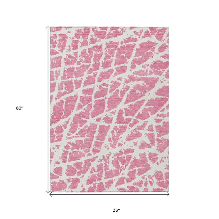 3' X 5' Pink and Ivory Abstract Washable Non Skid Indoor Outdoor Area Rug