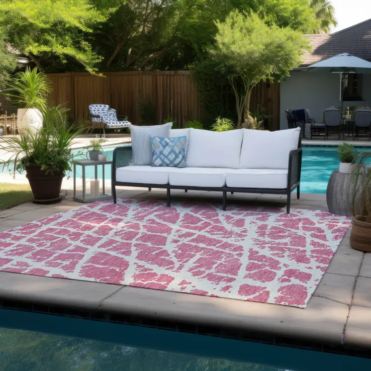 8' X 10' Pink and Ivory Abstract Washable Non Skid Indoor Outdoor Area Rug