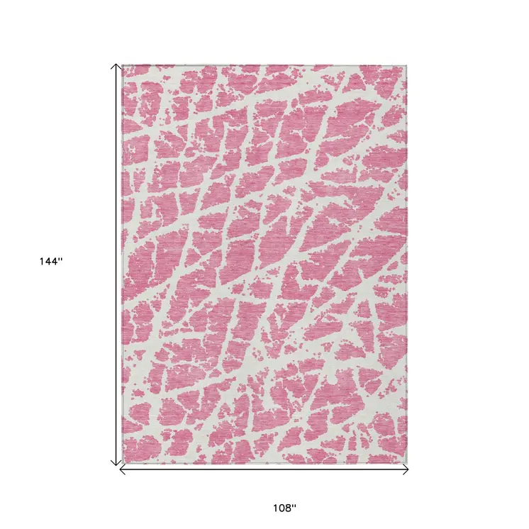 9' X 12' Pink and Ivory Abstract Washable Non Skid Indoor Outdoor Area Rug