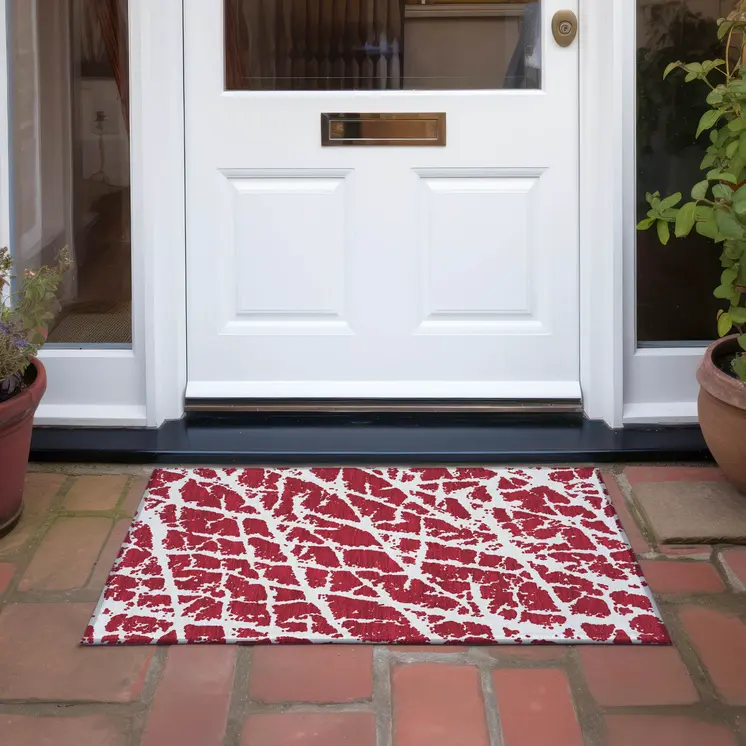 2' X 3' Red and White Abstract Washable Non Skid Indoor Outdoor Area Rug