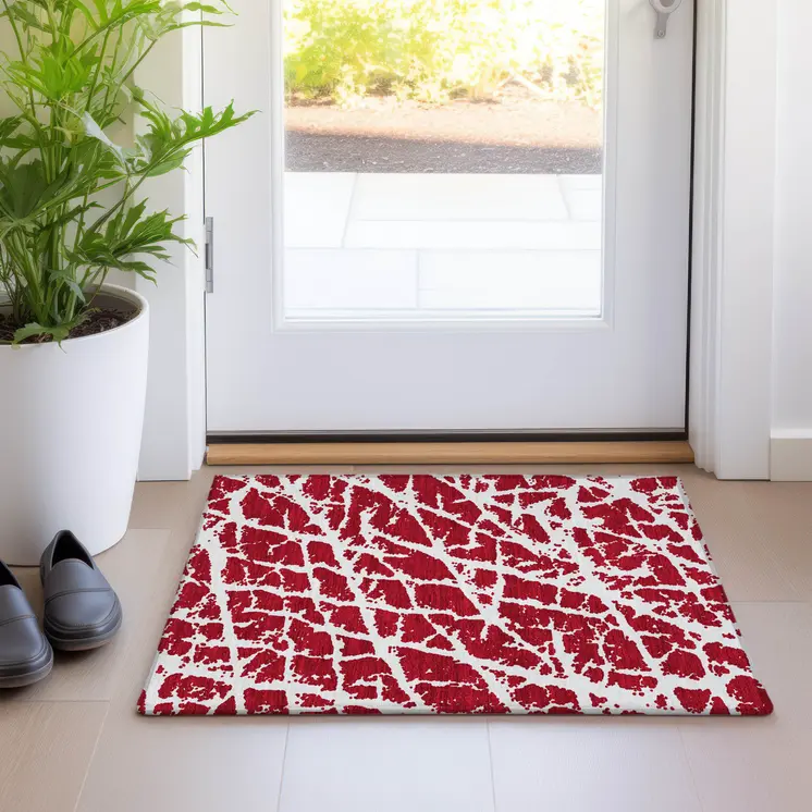 2' X 3' Red and White Abstract Washable Non Skid Indoor Outdoor Area Rug