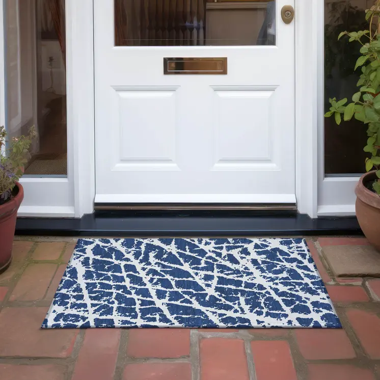 2' X 3' Navy and Ivory Abstract Washable Non Skid Indoor Outdoor Area Rug