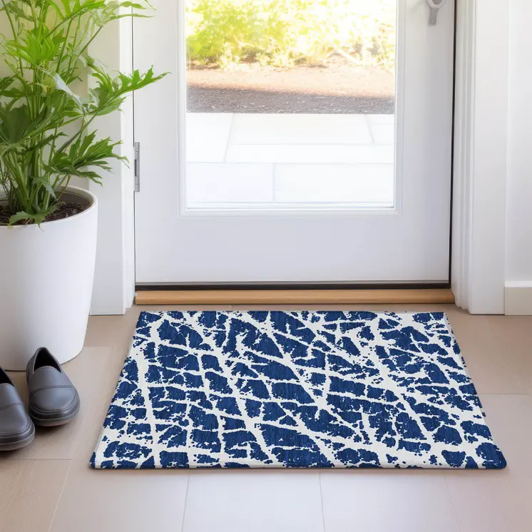 2' X 3' Navy and Ivory Abstract Washable Non Skid Indoor Outdoor Area Rug