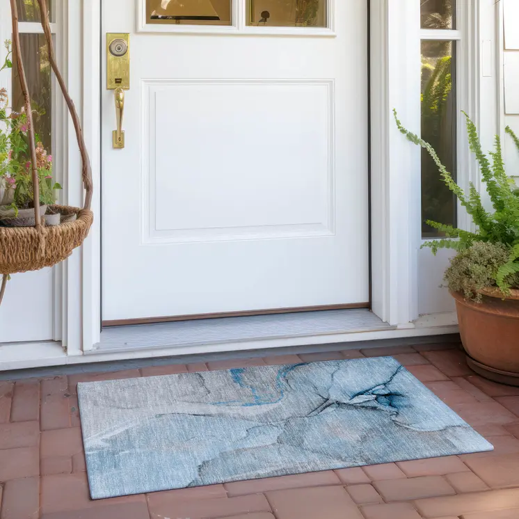 2' X 3' Blue and Ivory Abstract Washable Non Skid Indoor Outdoor Area Rug