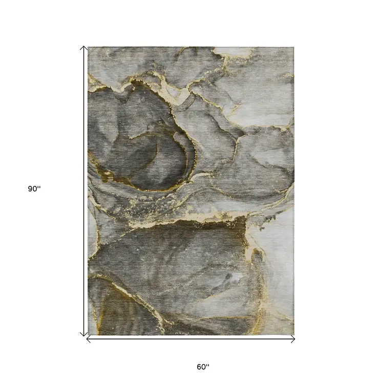 5' X 8' Gray and Gold Abstract Washable Non Skid Indoor Outdoor Area Rug