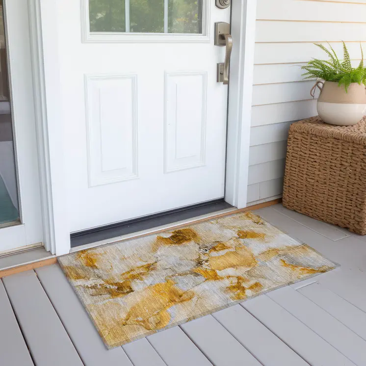 2' X 3' Orange and Ivory Abstract Washable Indoor Outdoor Area Rug