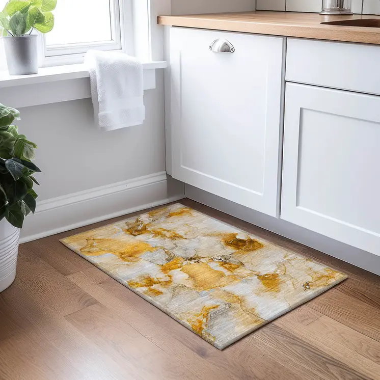2' X 3' Orange and Ivory Abstract Washable Indoor Outdoor Area Rug