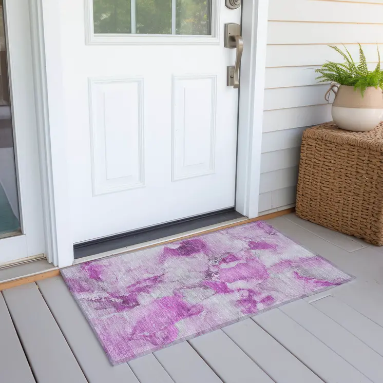 2' X 3' Pink and Ivory Abstract Washable Non Skid Indoor Outdoor Area Rug