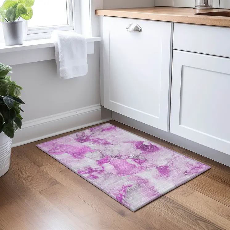 2' X 3' Pink and Ivory Abstract Washable Non Skid Indoor Outdoor Area Rug