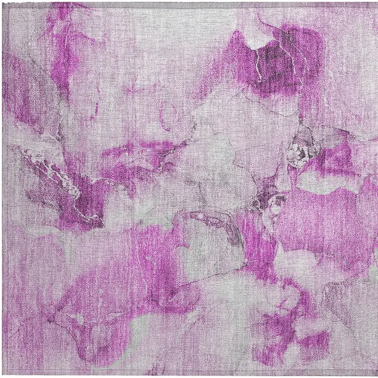 2' X 3' Pink and Ivory Abstract Washable Non Skid Indoor Outdoor Area Rug