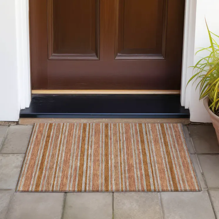 2' X 3' Beige and Orange Striped Washable Non Skid Indoor Outdoor Area Rug
