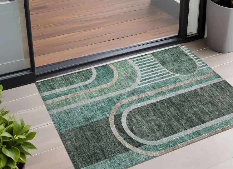 2' X 3' Black and Green Abstract Washable Indoor Outdoor Area Rug