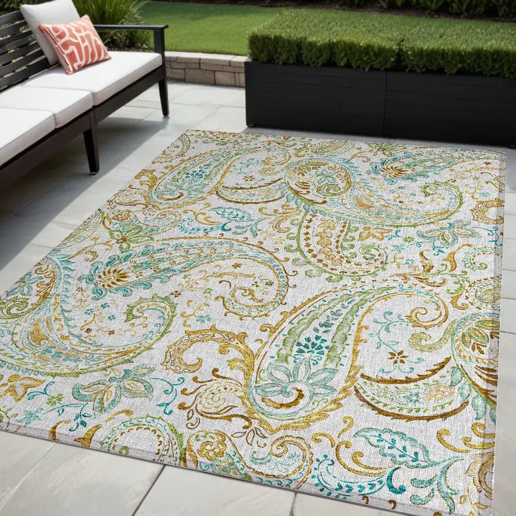 5' X 8' Ivory and Gold Paisley Washable Non Skid Indoor Outdoor Area Rug