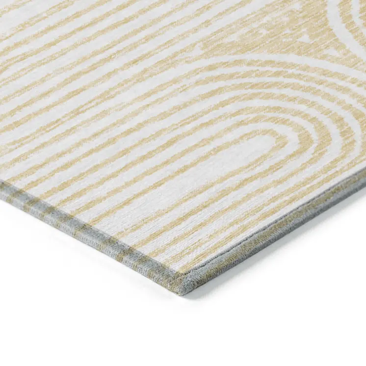 2' X 3' Gold and White Abstract Washable Non Skid Indoor Outdoor Area Rug