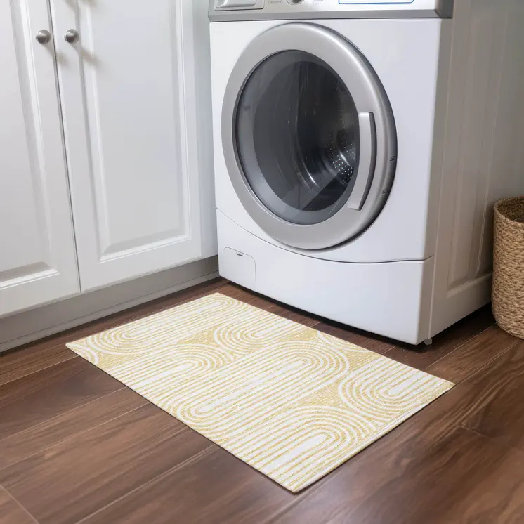 2' X 3' Gold and White Abstract Washable Non Skid Indoor Outdoor Area Rug