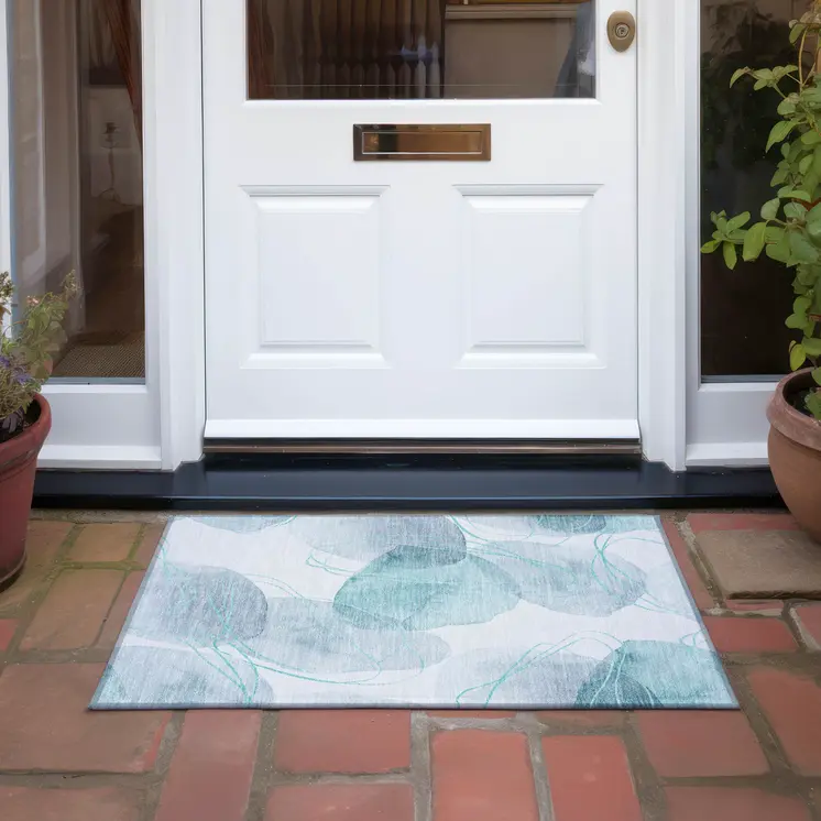 2' X 3' Teal and Ivory Abstract Washable Non Skid Indoor Outdoor Area Rug