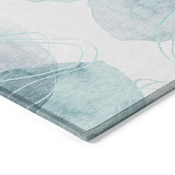 8' X 10' Teal and Ivory Abstract Washable Non Skid Indoor Outdoor Area Rug