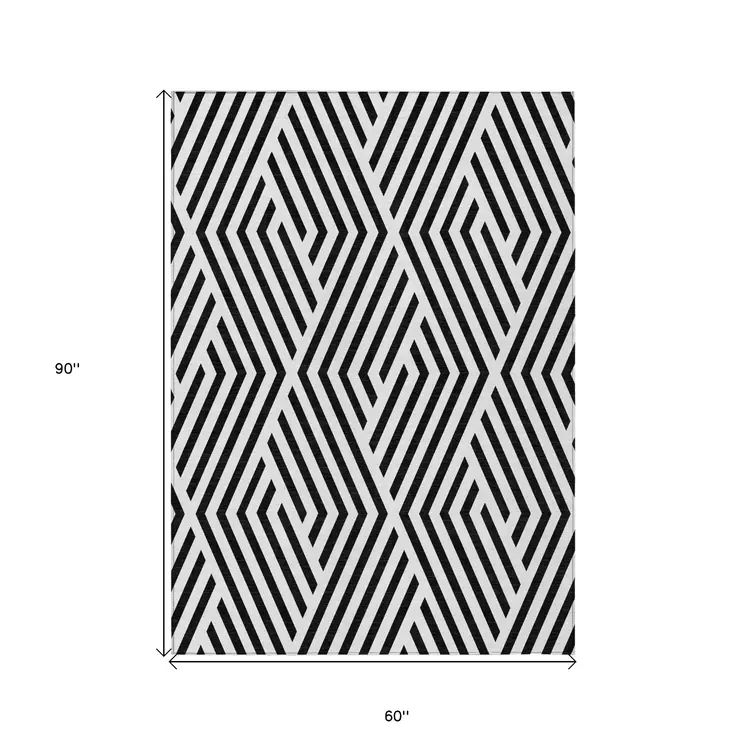 5' X 8' Black and White Geometric Washable Non Skid Indoor Outdoor Area Rug
