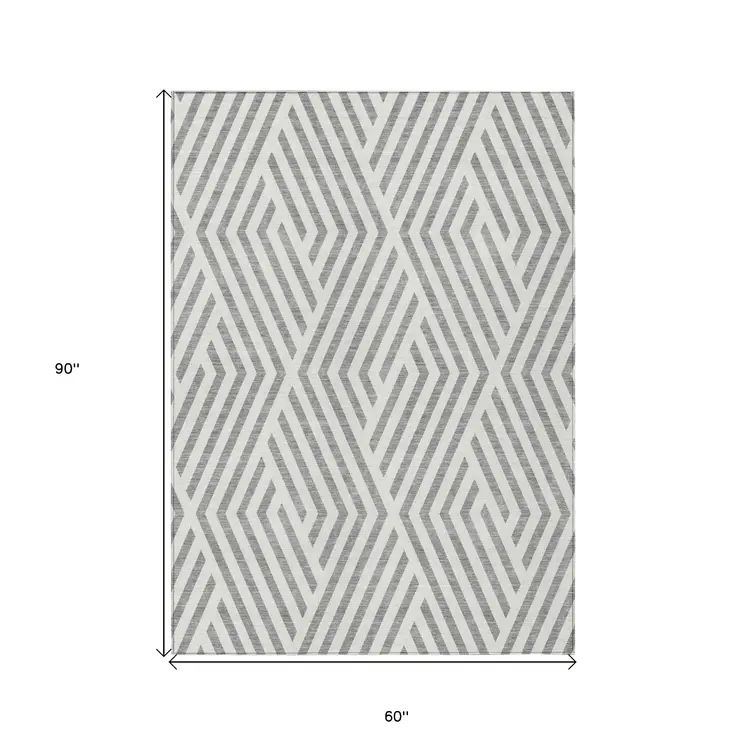 5' X 8' Gray and Ivory Geometric Washable Non Skid Indoor Outdoor Area Rug