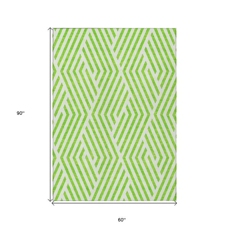 5' X 8' Lime Green and White Geometric Washable Non Skid Indoor Outdoor Area Rug