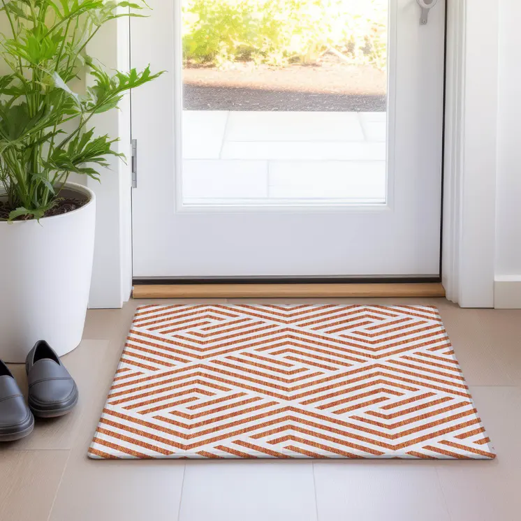2' X 3' Orange and White Geometric Washable Non Skid Indoor Outdoor Area Rug