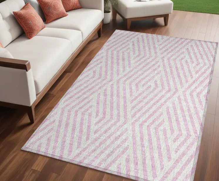 5' X 8' Pink and White Geometric Washable Non Skid Indoor Outdoor Area Rug