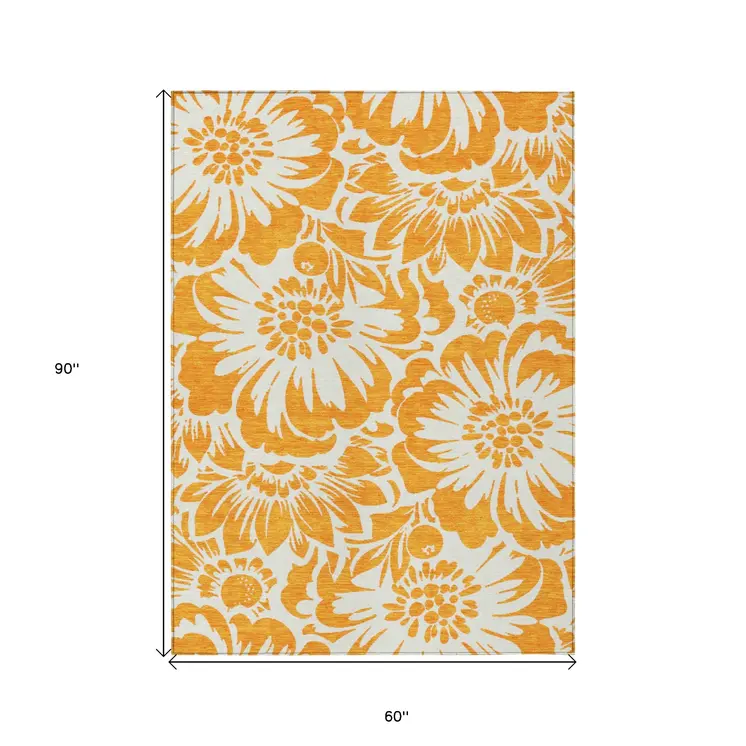 5' X 8' Orange and White Floral Washable Non Skid Indoor Outdoor Area Rug