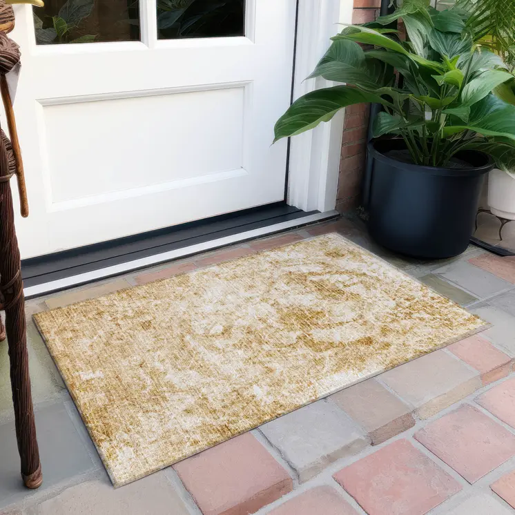 2' X 3' Cream and Gold Abstract Washable Non Skid Indoor Outdoor Area Rug