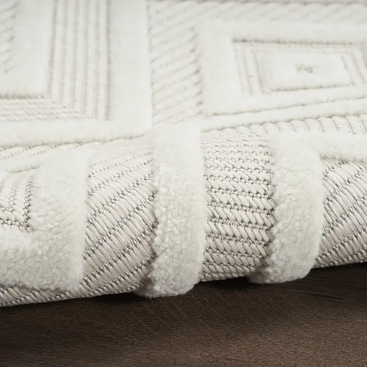 8' Ivory And White Geometric Indoor Outdoor Runner Rug