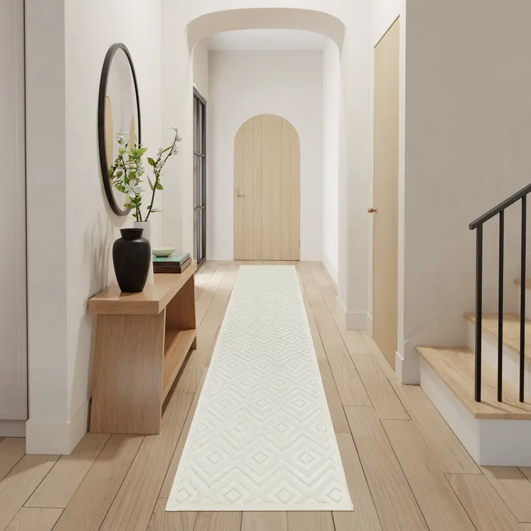 8' Ivory And White Geometric Indoor Outdoor Runner Rug