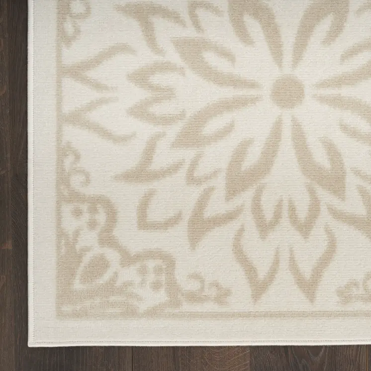 7' X 10' Beige and Ivory Floral Non Skid Area Rug