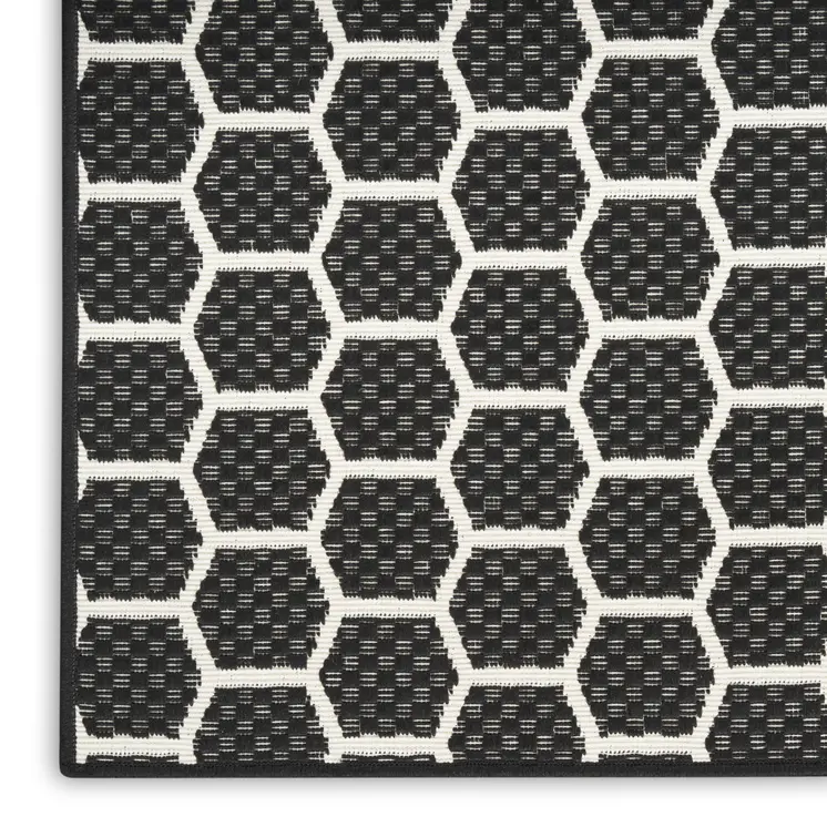 8' Black And Ivory Geometric Indoor Outdoor Runner Rug