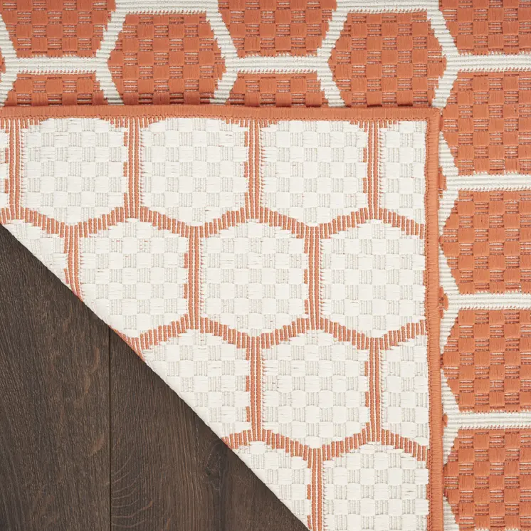 8' Coral And Ivory Geometric Indoor Outdoor Runner Rug