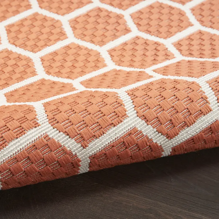 8' Coral And Ivory Geometric Indoor Outdoor Runner Rug